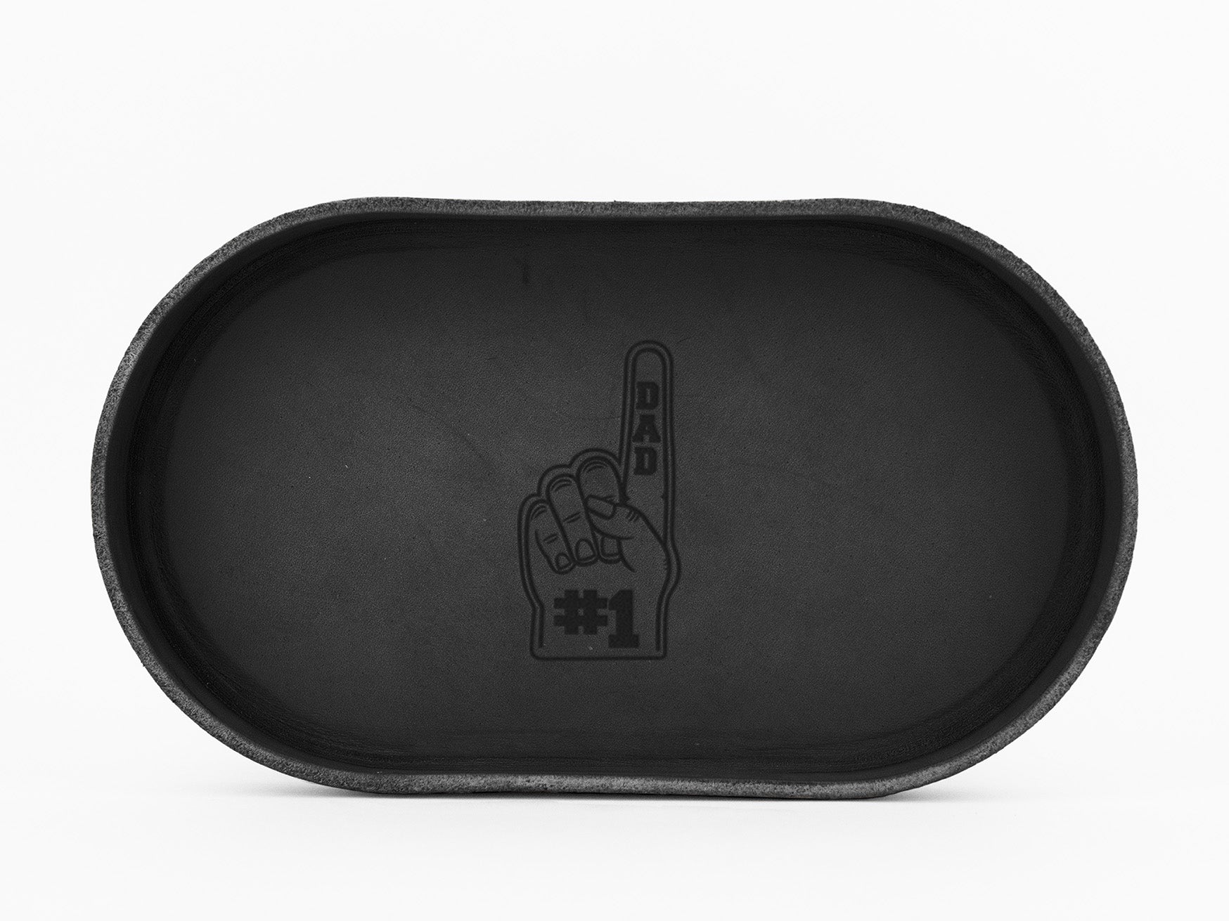 A black oval tray with an image of a foam finger showing DAD on the index finger and #1 on the palm, centered at the bottom of the tray.