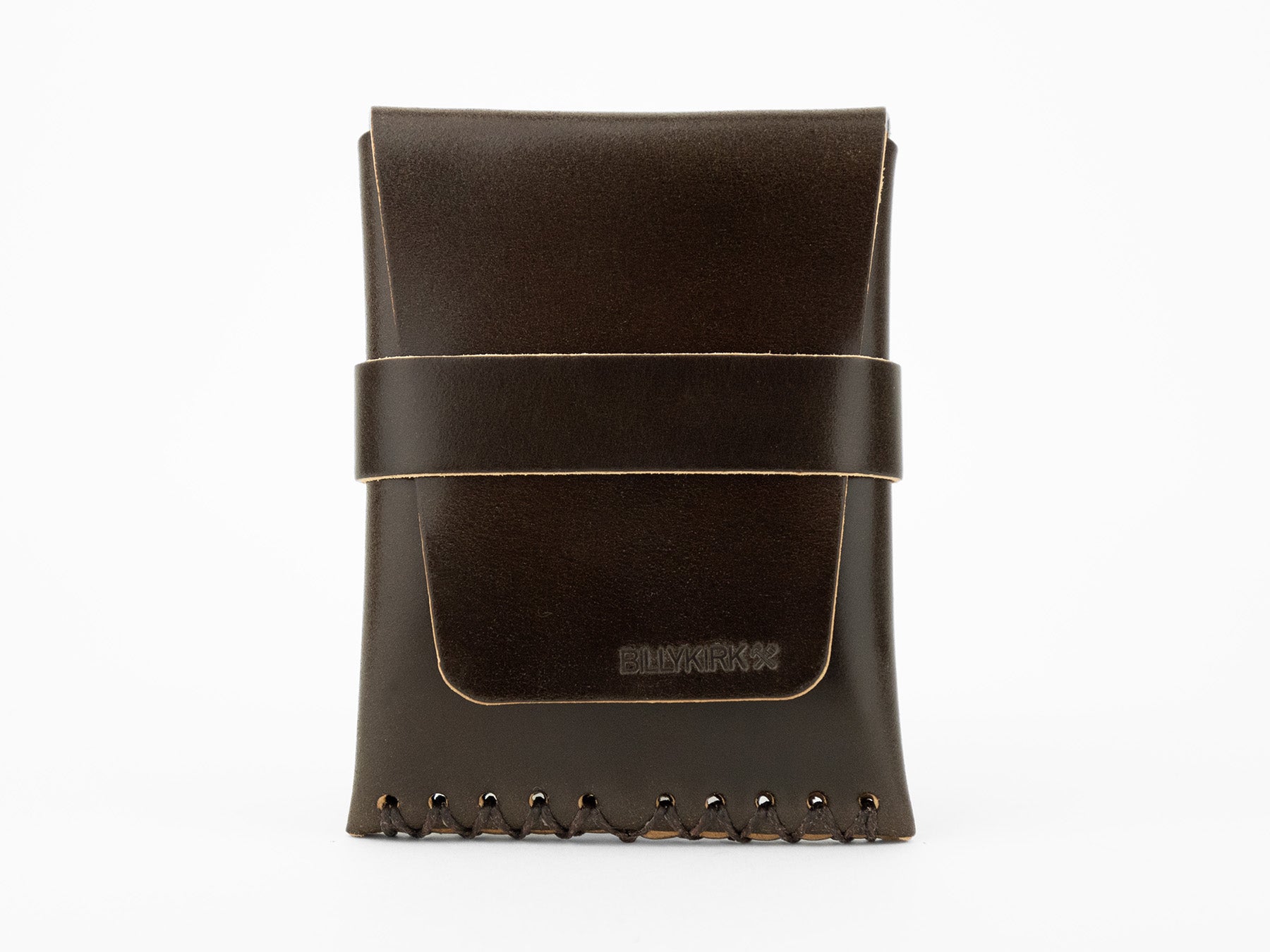 A dark brown leather pouch with visible stitching at the bottom and a horizontal strap across the front, displayed upright on a white background. The word BLVKRVK is embossed on the front flap.