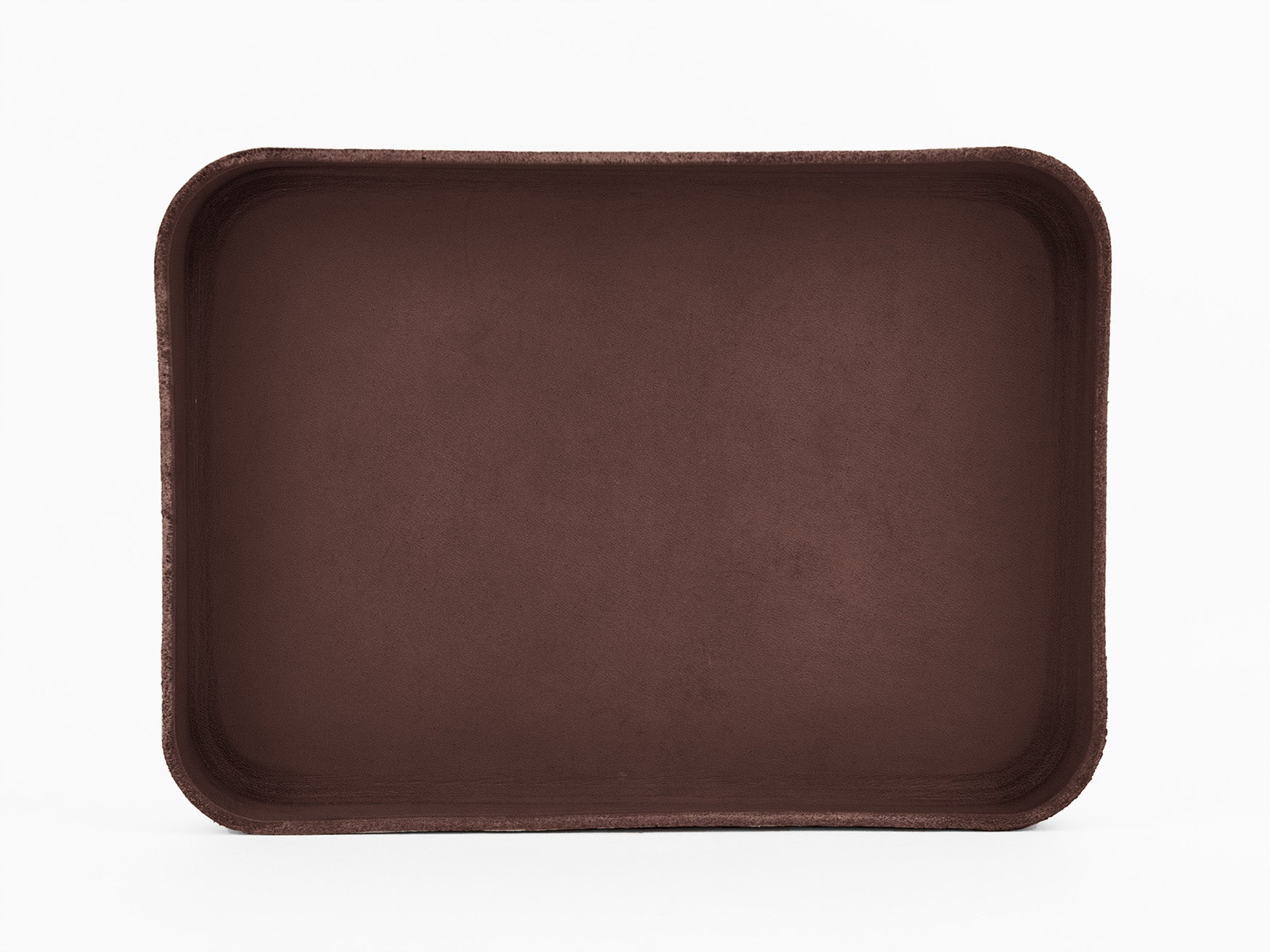 A rectangular, dark brown tray with rounded corners, photographed against a plain white background. The tray appears empty and has a smooth, slightly textured surface.
