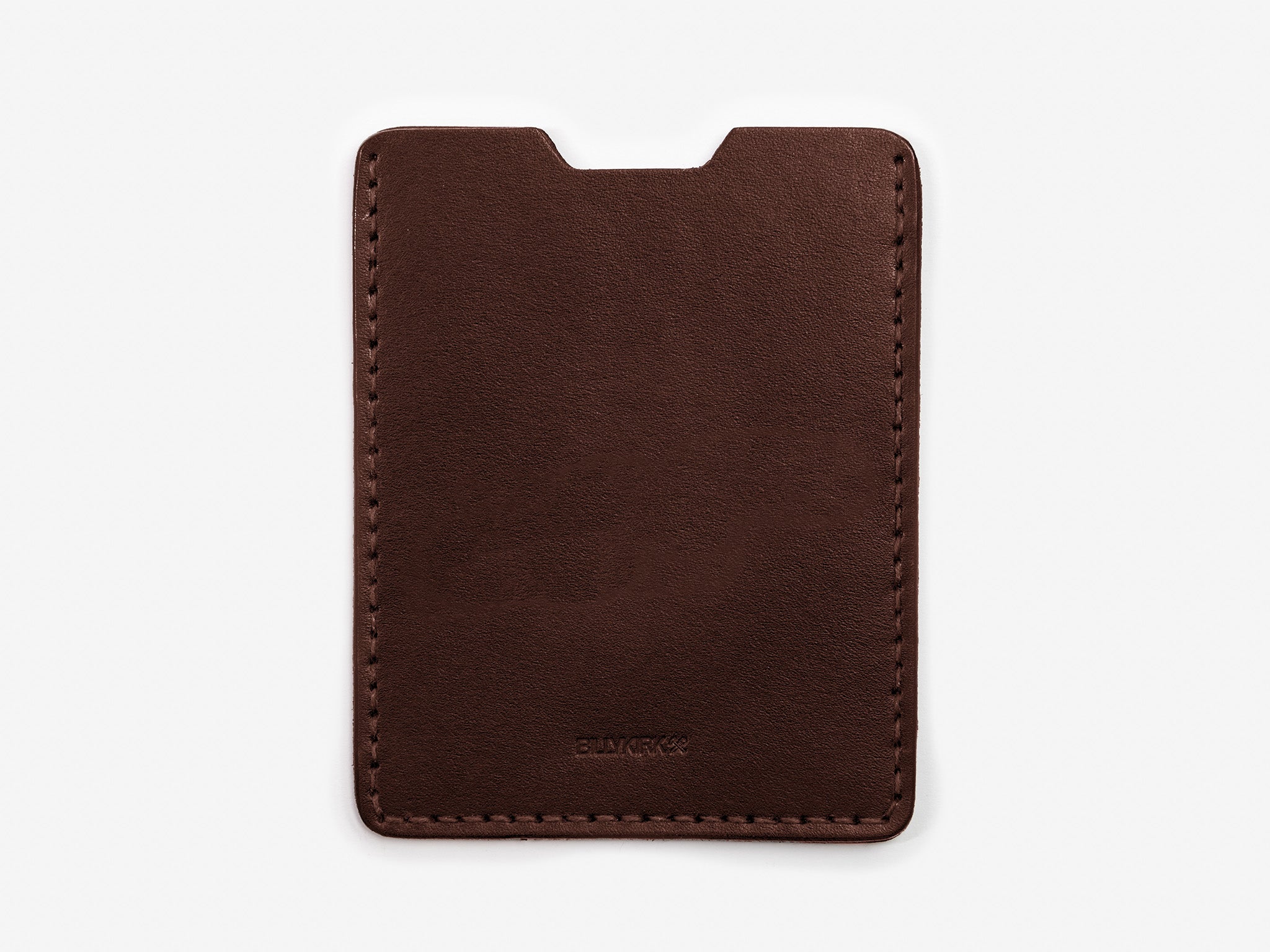 A slim, rectangular brown leather card holder with rounded corners, minimal stitching along the edges, and a small notch at the top center.