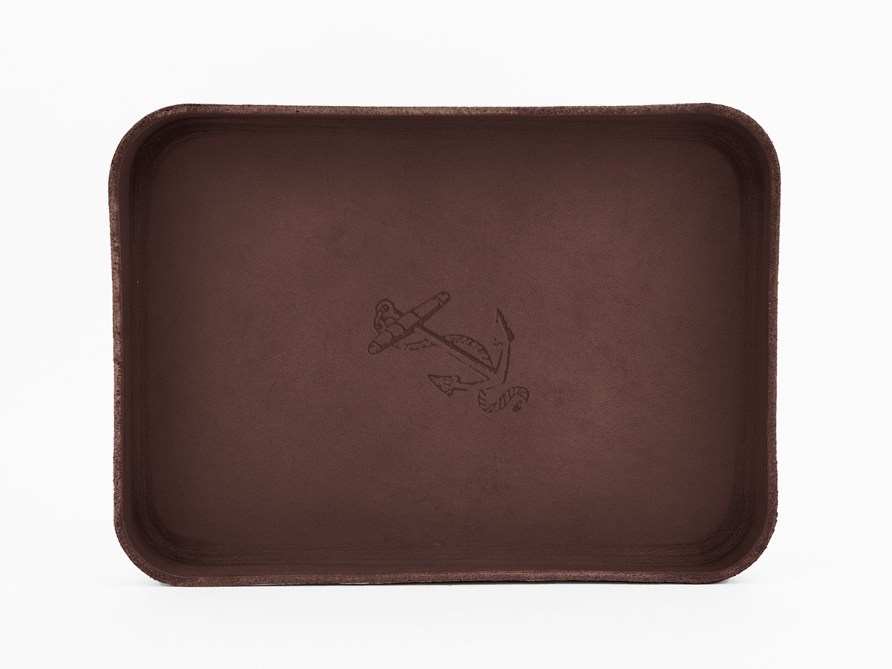 A rectangular, dark brown tray with slightly curved edges and an engraved anchor design in the center, set against a plain white background.