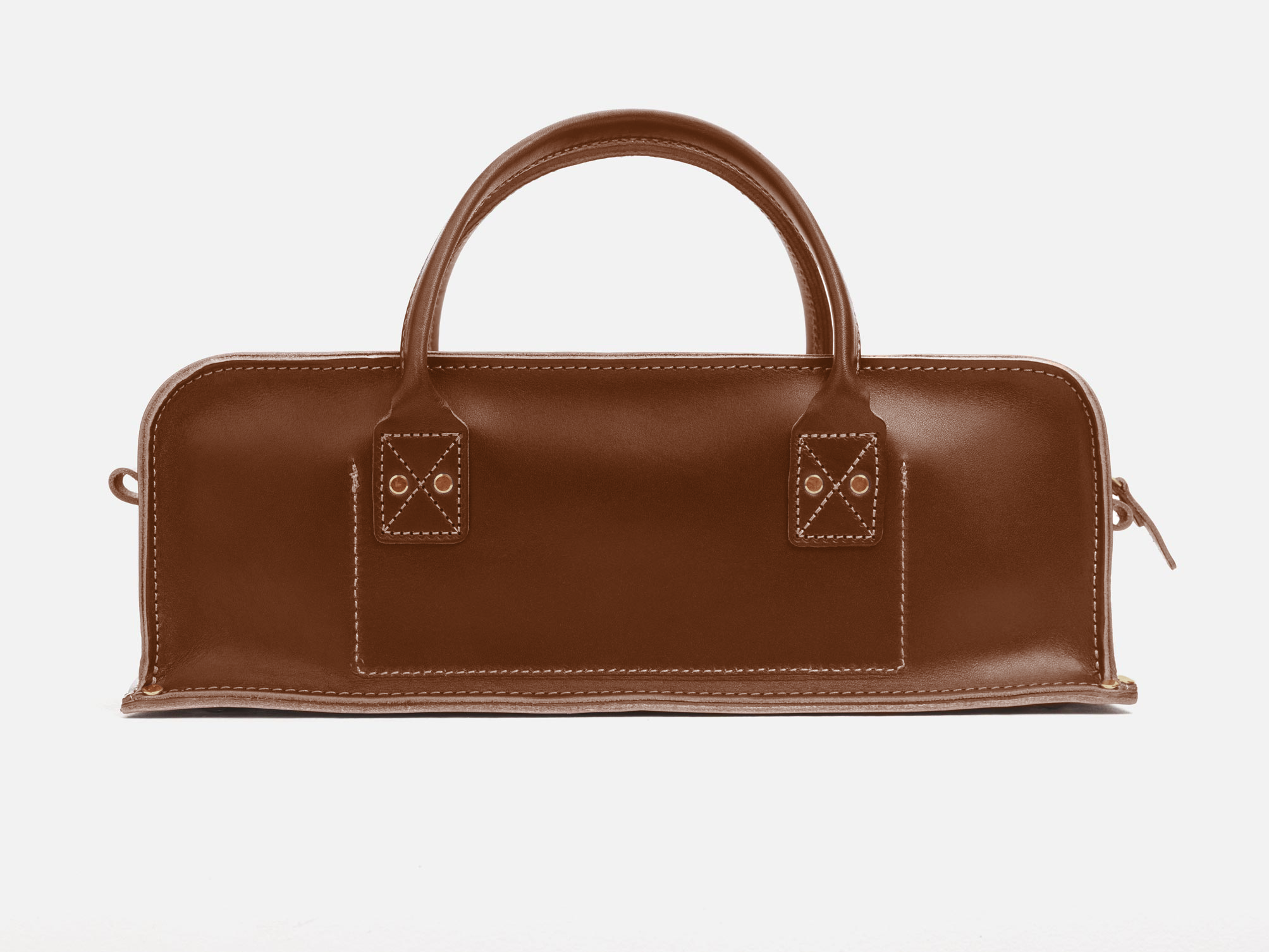 A rectangular brown leather handbag with two rounded handles, visible white stitching, and a zipper on the right side, set against a plain white background.
