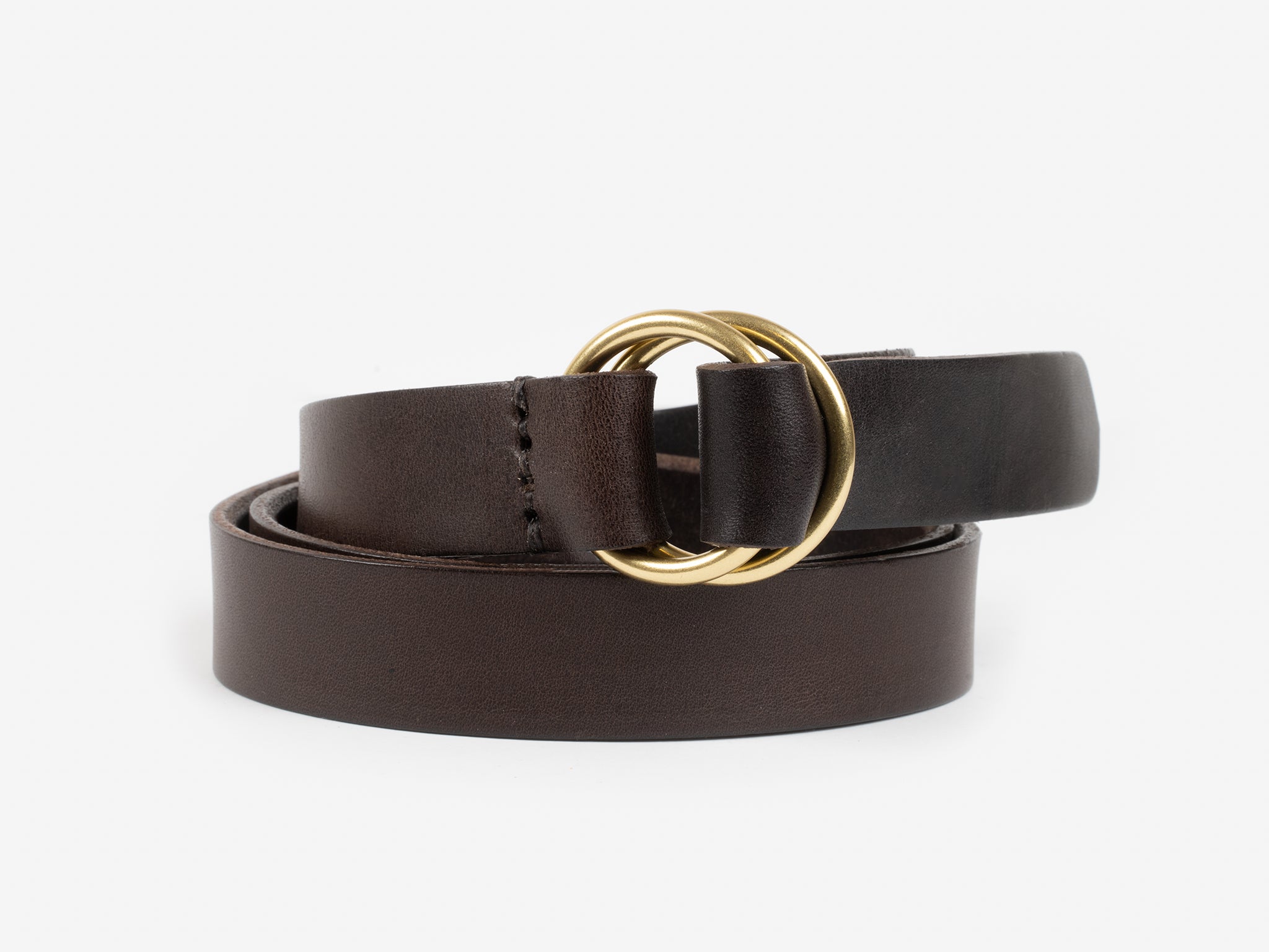 A dark brown leather belt with two overlapping gold metal rings as the buckle, displayed against a plain white background.