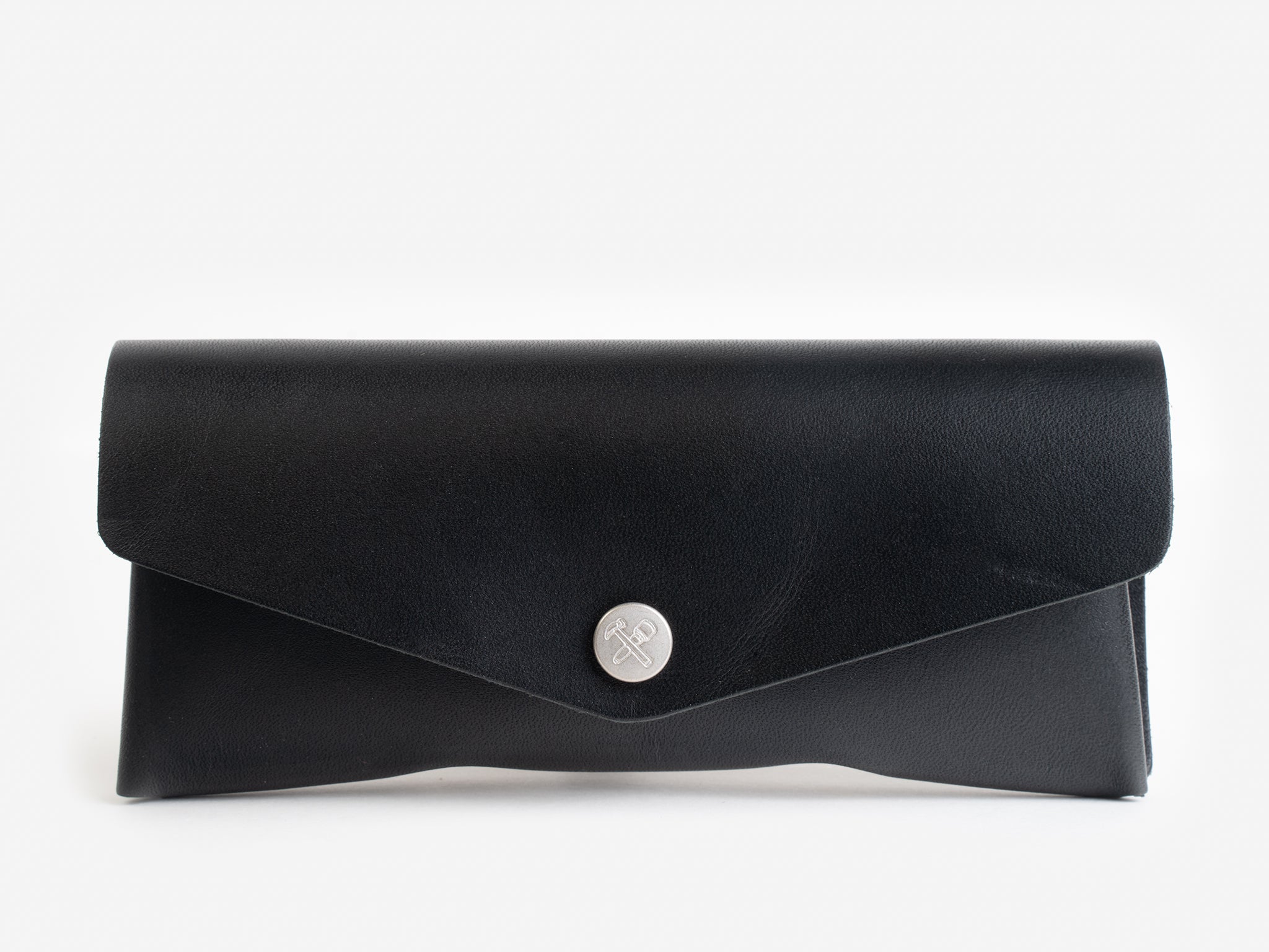 A black leather envelope-style clutch purse with a silver button clasp, displayed against a plain white background.