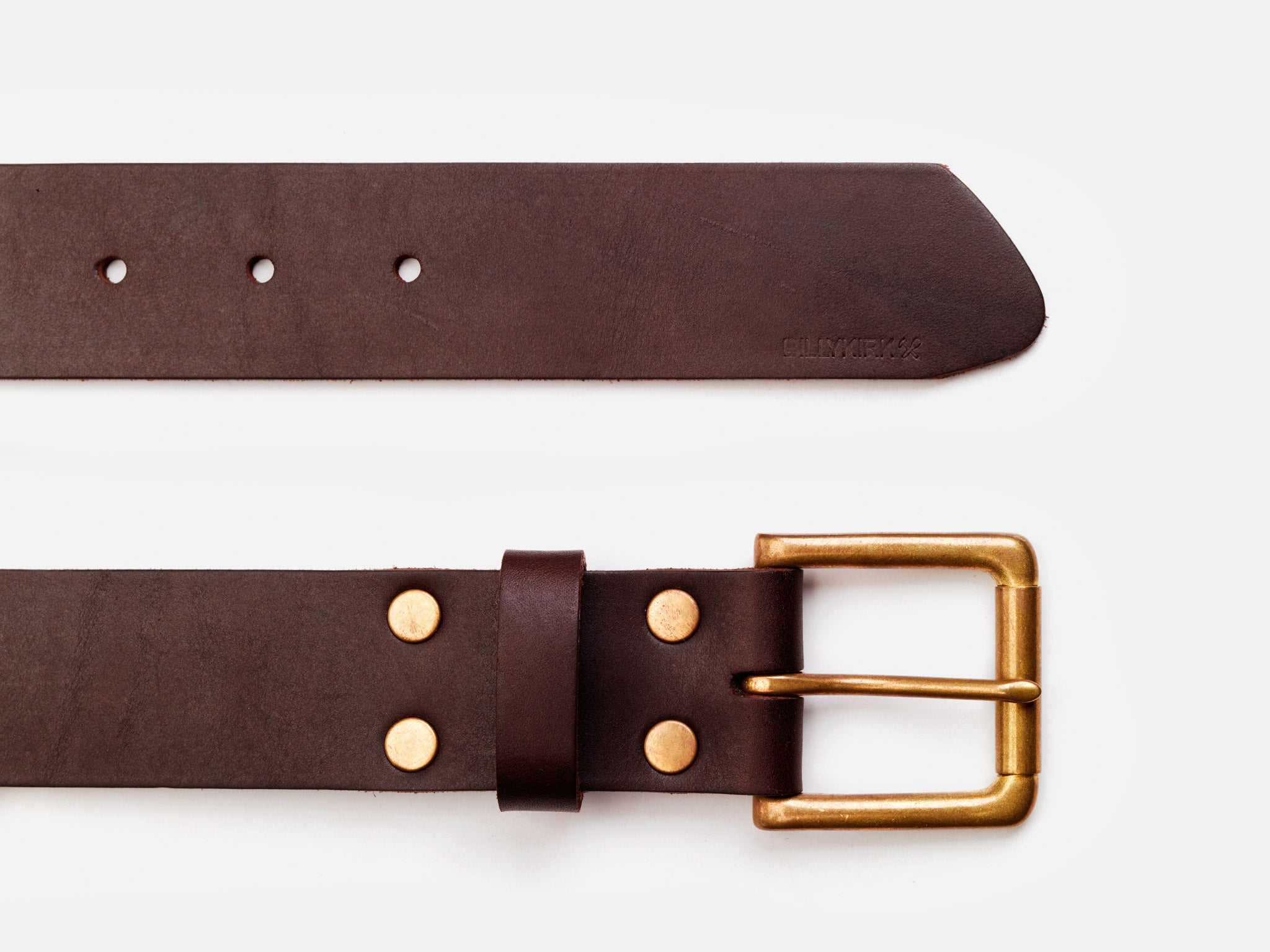 A brown leather belt with a gold-colored metal buckle and rivets, shown laid flat on a white background. The belt has multiple adjustment holes and a pointed tip.